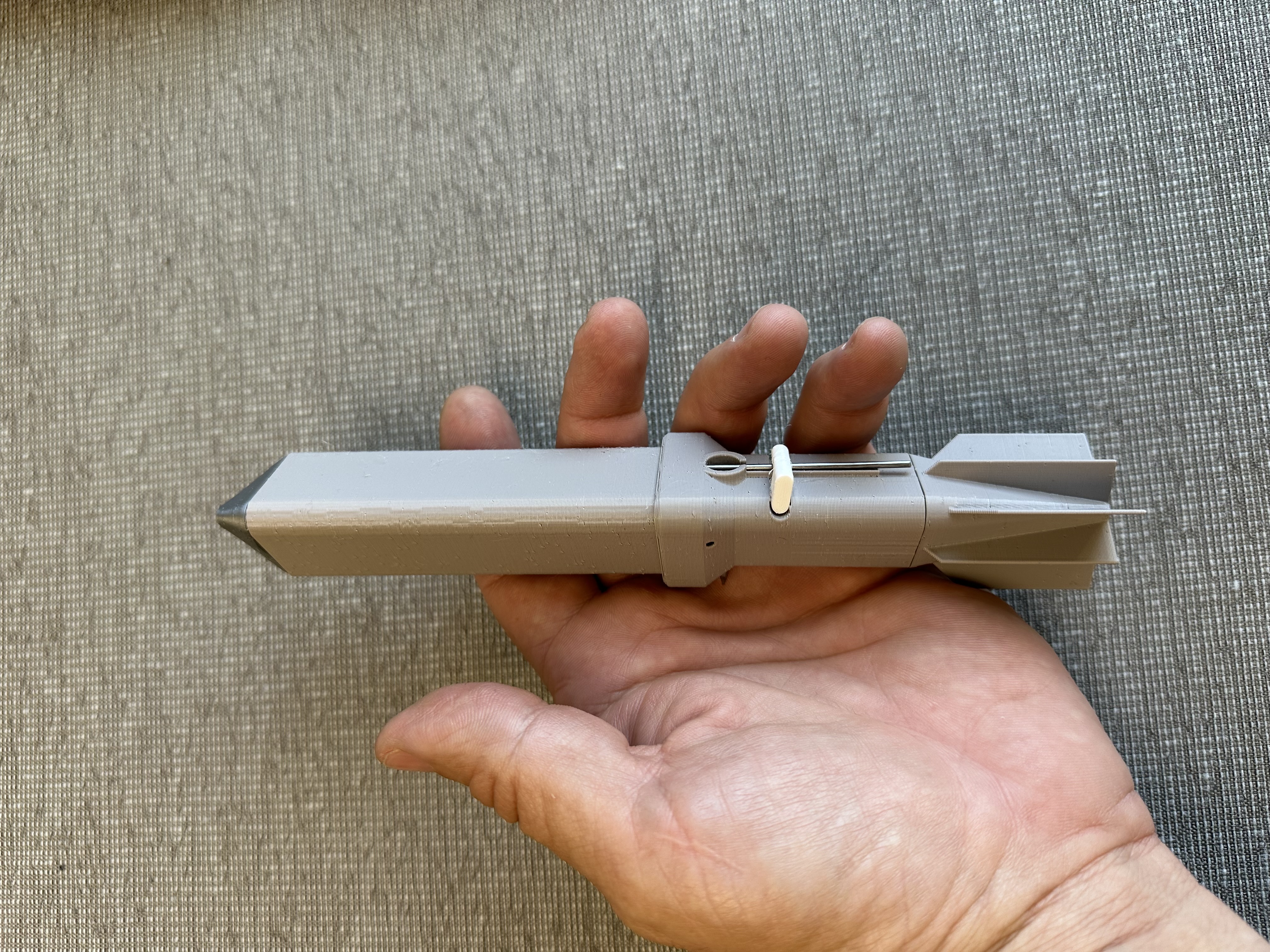 Mod 2 triangular flare in hand for scale